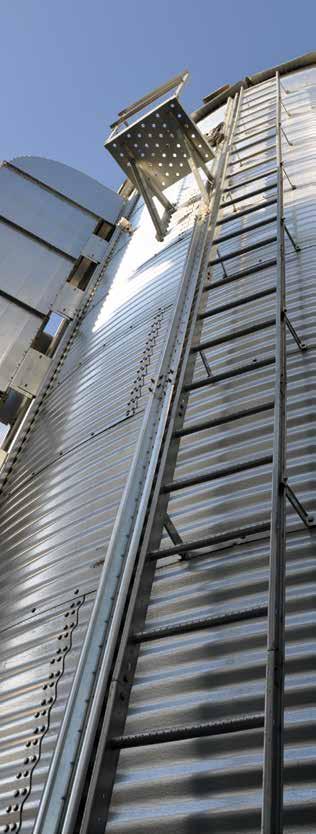 Large platforms provide a stable work area for monitoring or servicing the crop dryer units.