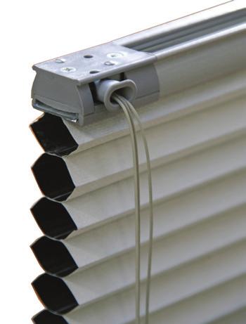 The head and bottom rails are manufactured from extruded aluminium alloy and fixed to the window with steel brackets.