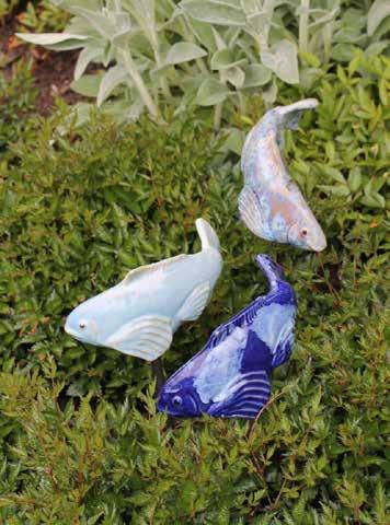 NEW GARDEN DÉCOR We have several new and interesting items in and around The Shop about which we are pretty excited. Fish in the Garden are created by Maine artist Tyson M. Weiss.