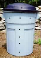 You can build a unit out of wood, mesh or concrete blocks or you can modify an old barrel or garbage can.
