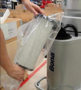 Place the HEPA filter in a plastic bag to prevent harmful particles spread into