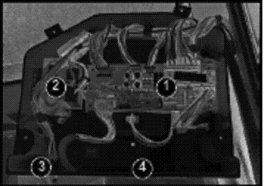 Disconnect the six harness connectors from the board terminals.