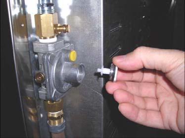 Replace nozzles using the conversion set supplied with the range or by a Bertazzoni