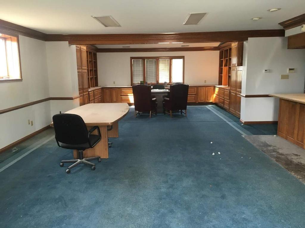 EXECUTIVE OFFICE SUITE #1- CUSTOM BUILT-IN, SOLID CHERRY, CREDENZA, DESK, LATERAL FILE CABINETS, BOOK CASES AND STORAGE CABINETS, THREE COLOR PATTERN CARPET,