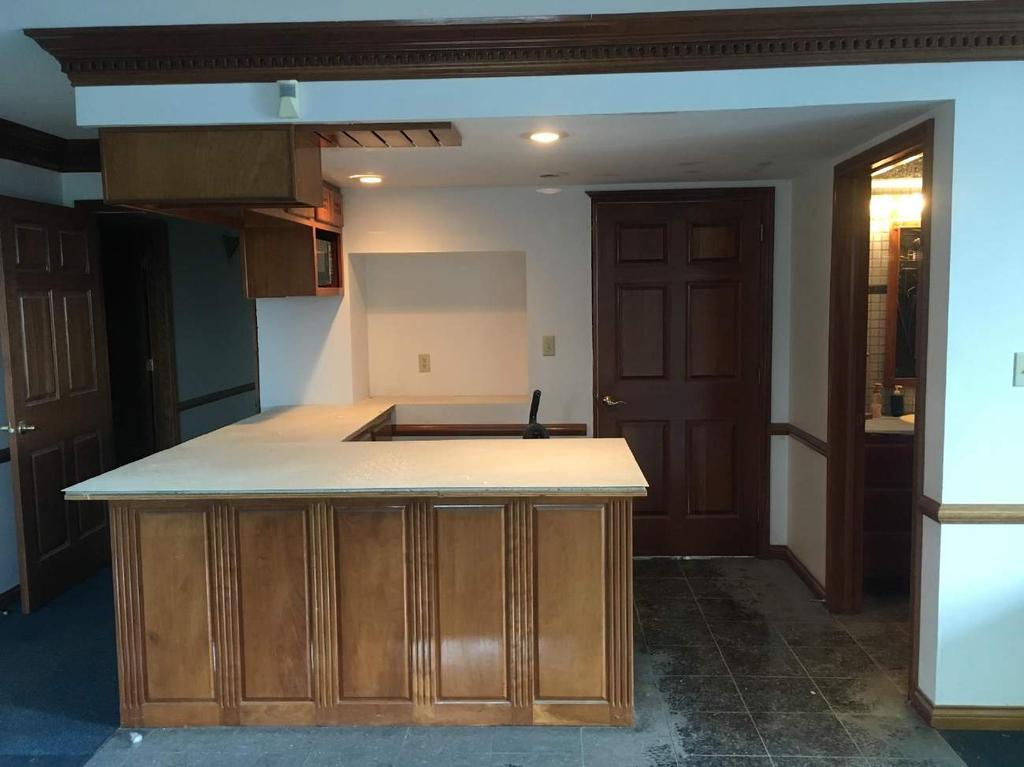 EXECUTIVE OFFICE SUITE #1, EN SUITE KITCHENETTE- CUSTOM BUILT-IN, SOLID CHERRY SINK BASE AND