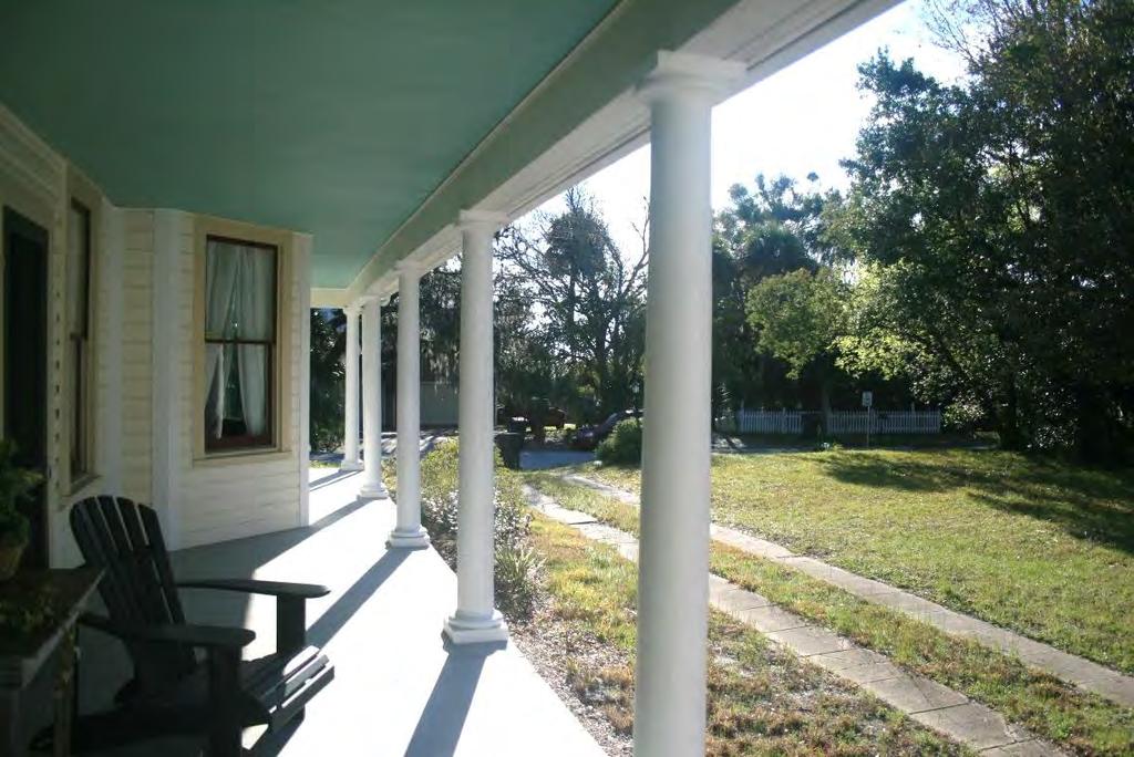 Porches were usually one-story high and partial or full-width across the front of the home, often wrapping either one or both sides of the building.