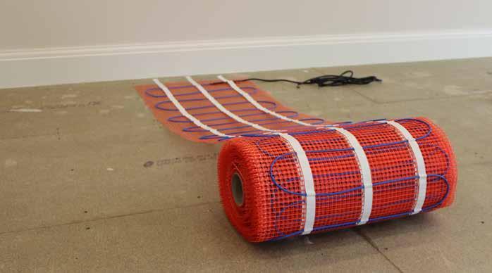 9. Roll out and position the CoziMat underfloor heating mat(s), with the