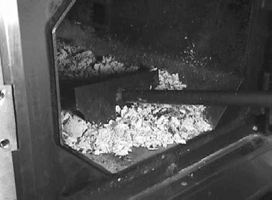 If necessary, reposition meat on racks for maximum clearances. 4. Put a small amount of wood in the Firebox.