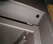 Follow the Steps shown to remove the Horizontal access panel, unlatch the door buckles, remove the door, then replace in