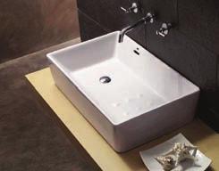 No tap hole basin with wall-mounted taps Becoming more popular for bespoke bathrooms, these use wall-mounted designer bib taps with concealed pipework.