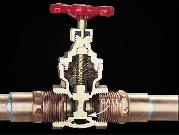 At these valves, there is a small bleed or drain outlet on the downstream side of the valve.