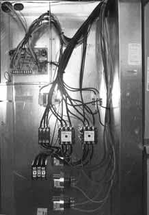 The high-voltage connection is terminated at the high-voltage terminal block. The suggested mounting for the field-installed disconnect is on the exterior side of the electrical control box.