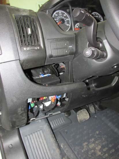 Carefully remove plastic dash insert on driver side