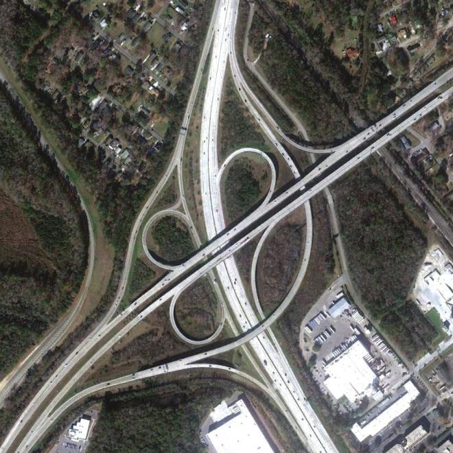 ITS and Incident Management Exhibit 3-2: I-526 Interchanges with I-26 (left) and Rivers Avenue (right) SCDOT has an up-to-date Traffic Management Center (TMC) located adjacent to the District 6