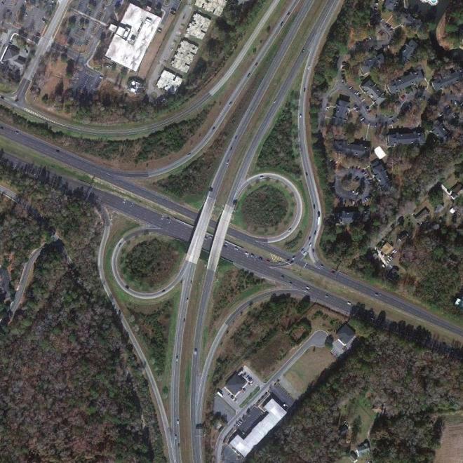 I-526 & US 17/Savannah Highway: This interchange, shown in Exhibit 3-6, is a partial diamond with a loop serving the northbound US 17 to eastbound I-526 movement.