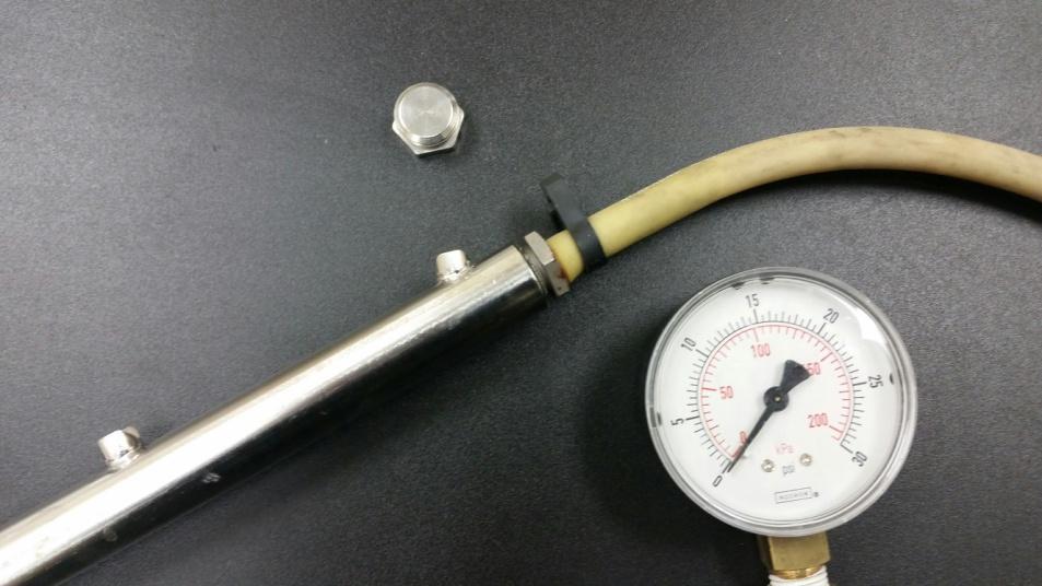 2 HOW TO USE THE PRESSURE TESTER FOR LOW TEMP MACHINES Remove one of the