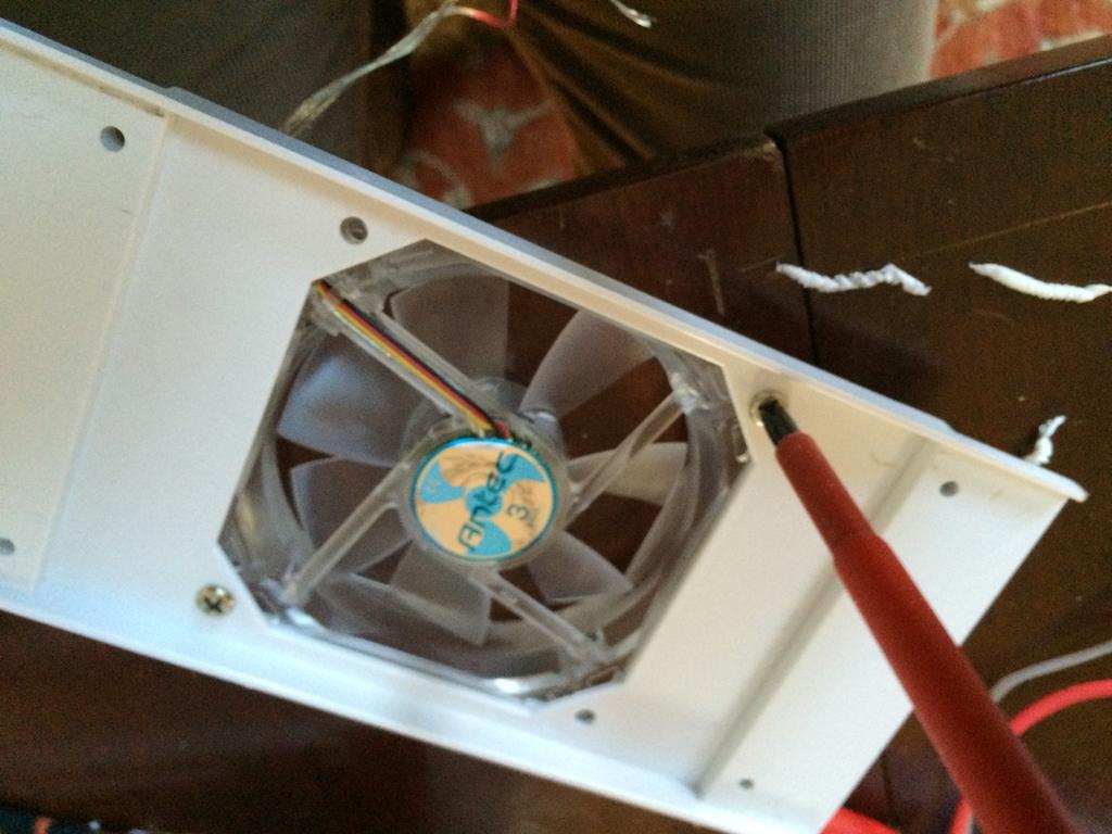 Step 8 Detach fan from bracket/shroud There will probably only be two of those stubby fan screws per fan.