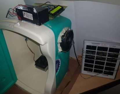Fig-1: Compressor Less Solar Refrigerator This system consists of Solar Panel, two Peltier devices, two Battery, Temperature Sensor, two cooling fan with heat sink attached with each peltier device