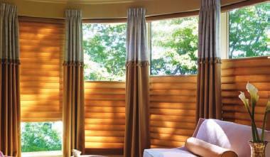 Vertical Solutions Select Vertical Blinds Vignette Modern Roman Shades Designer look An offering of competitive fabric, vinyl and S-Curve options.