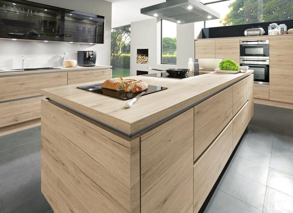 mix of fronts in Sanremo oak with sophisticated black glass.