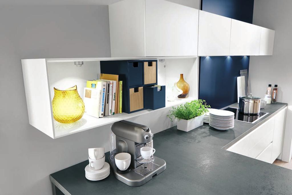 S12-13_Laser416_S_13536_14.jpg Laser 416 White The lacquered open shelf wall unit with faceted edge was combined with shelf and drawer inserts in this kitchen design idea.