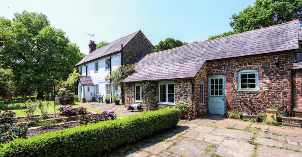 I The Property Allington Cottage cleverly combines spacious contemporary open plan living space with cottage cosiness from period origins.