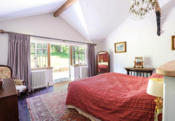 The drawing room has elegant proportions with exposed boarded oak floor and the kitchen/breakfast room has a vaulted ceiling creating a flexible living space with views and