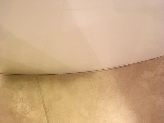 Observations: Voids in the caulking/grout where flooring butts against shower/tub, recommend resealing to prevent water penetration that can result