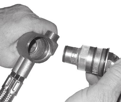 Use a adjustable wrench to unthread THERMOSTATIC CARTRIDGE () from housing. Fig.
