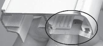 Insert the center pull plate in the center channel and screw in at the center point of the headrail.