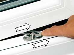 A top-opening window will have a button to press on either side of the window.