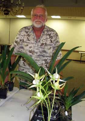 January Program Was Presented by Tom Kuligowski Our January speaker was Tom Kuligowski who has been growing orchids for a little over twenty years. Like so many hobbyists, he started with one plant.