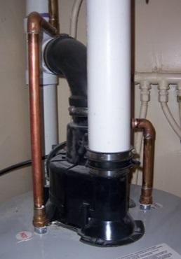 Sealed-combustion appliances are located close to an outside wall and vent through the wall. A double-walled vent tube functions as both air intake and exhaust flue.