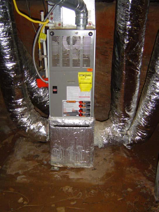 Figure 5: Draft fan-assisted HVAC system in a crawl space. The fan is designed to pull combustion by-products out of the heat exchanger and direct them into the exhaust flue.