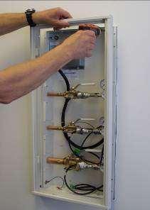Alarm Installation Installing the window frame and circuit board panel After the wall covering and