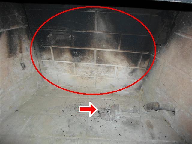 6.8 (2) The rear panel was loose and the gas burner was missing. Recommend further evaluation from a licensed chimney sweep. 6.8 Item 1(Picture) 6.