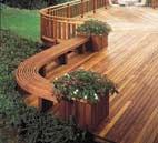 An existing oak is the centerpiece of a multi-level garden grade structure.