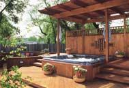 Geometrical tree-shaded deck. Inviting deck features a spiral staircase and six-sided contour.