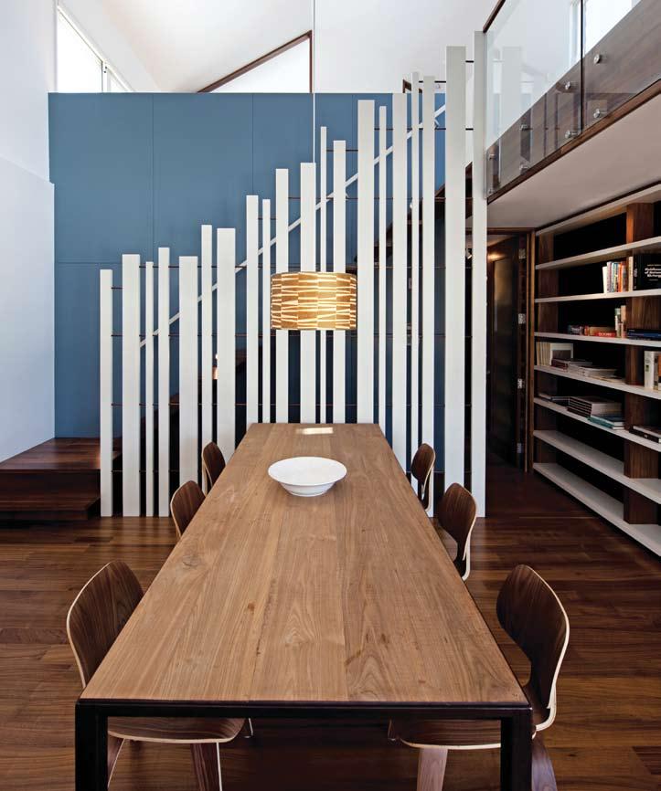 The dining room-cum-library is both the architect s and the clients favorite place in the home.