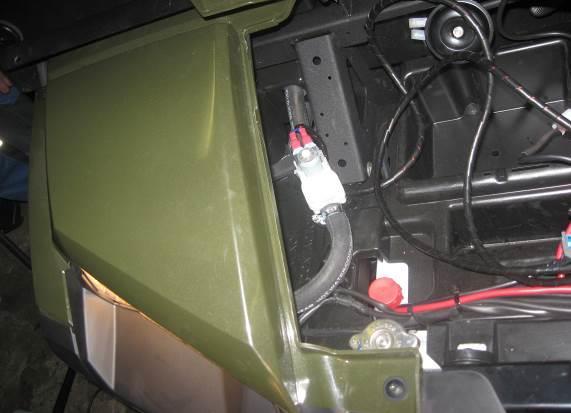 (For both types of heater) Lead the water hoses from the battery box
