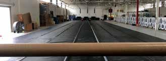 field seaming (PHOTOS D and E) The fabrication of geomembrane panels in a factory can greatly improve the economics of an installation.