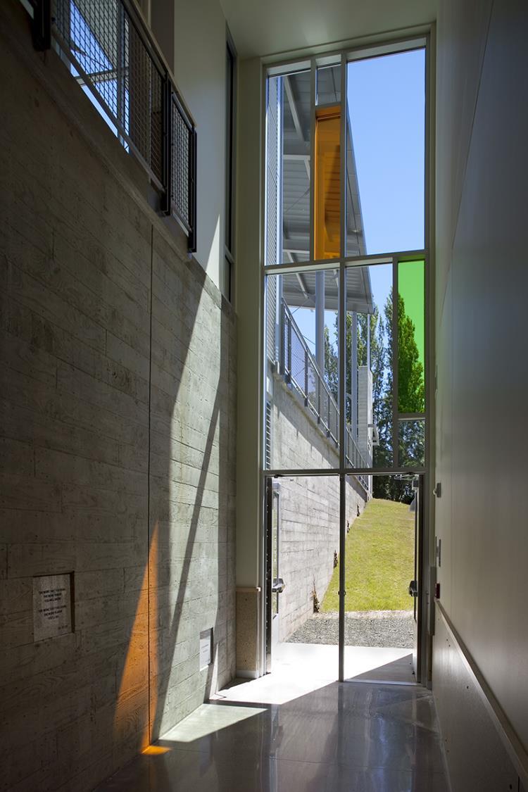 Above: rainwater is collected from a butterfly roof above the galleries, and cascades into a