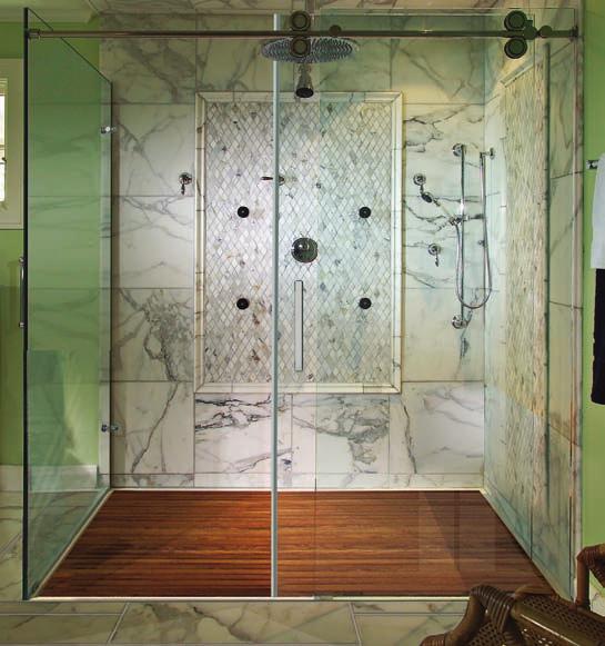 Shown above is the MTSB-7242MT low-profile multiple-threshold acrylic shower base recessed into the floor, teak shower tray and 2-sided glass enclosure.