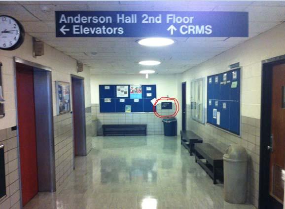 4.2 - Corridor Directional Signs: To facilitate viewing suspend Directional Signs from the ceiling where possible.