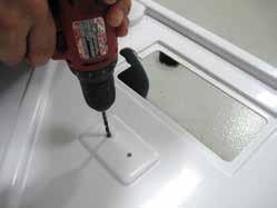 If 2" drain hole position is the other corner, drill the 1" supply tube hole on the opposite side of the