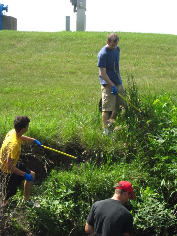 After installing the storm drain markers the volunteers removed 420 pounds of