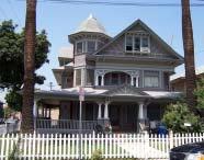 Queen Anne style buildings in Southern California are characterized by complex roofs of fairly steep pitch; combinations of siding materials such as lap boards and patterned shingles; rounded and