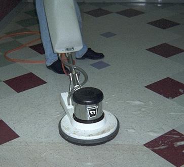Agitate stripping solution using the low speed floor machine overlapping each pass by several inches.