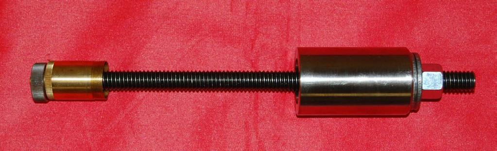 Then thread a washer and nut on the end of the rod. Once the washer and nut are in place, take the piece of tube and slide it towards the end of the rod, so that it strikes the washer.