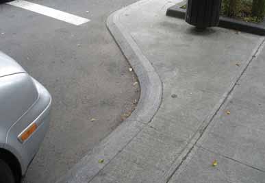Sidewalk paving materials should be concrete which is simple to construct, maintain and replace. The sidewalks should be detailed and constructed to a high quality.